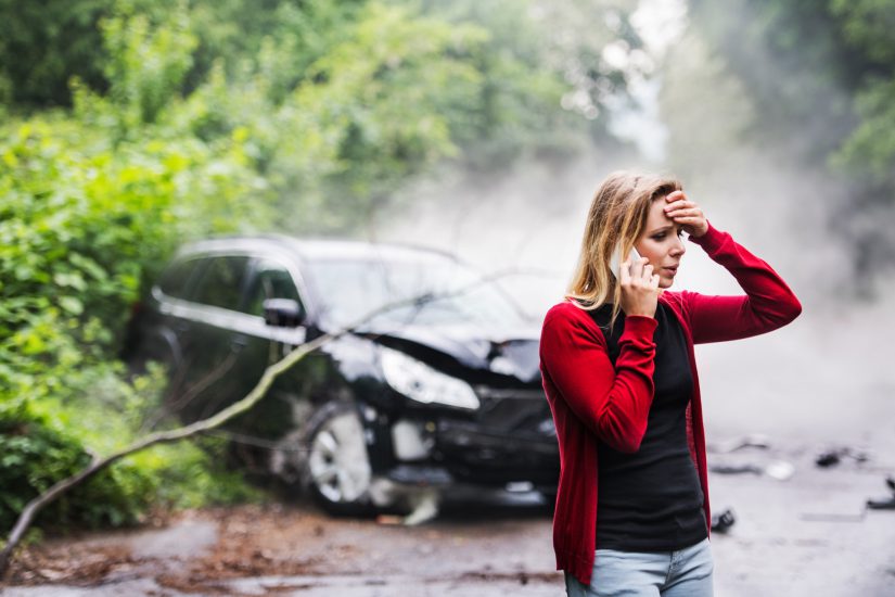 Photo of Woman After Car Crash With Smartphone Calling 911